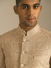 Beige hand embroidered sherwani perfect for grrom and day weddings